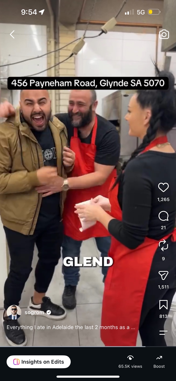 William Morgos laughing with the team at an Adelaide venue